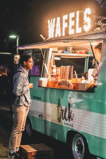 Man standing near food truck 2553651